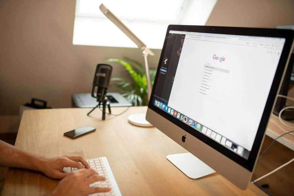 A person using google search on a computer