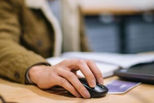 A person uses a computer mouse