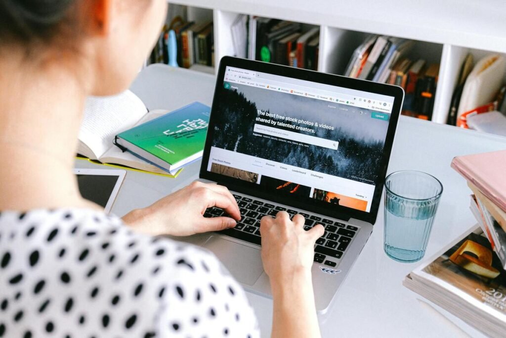 A woman using a laptop