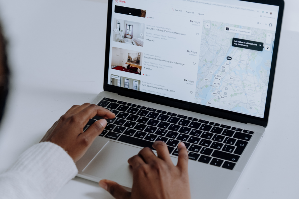 Person browsing local businesses on a Google Business page on a laptop