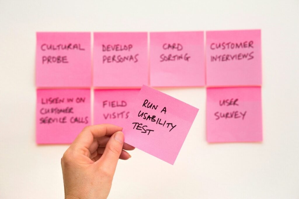 UX design strategies written on sticky notes.