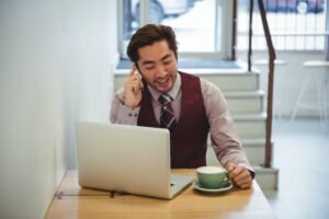 Businessman happy seeing the results from a Google ads specialist