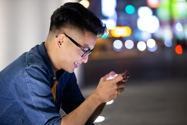 Man enjoying memes and videos