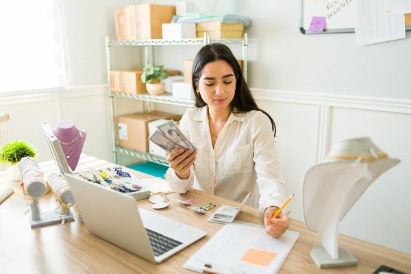 An entrepreneur making money from her business online.