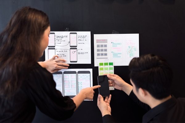 A team of web designers working together.