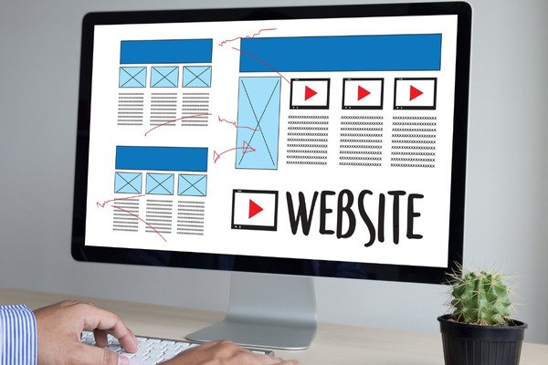 A web designer creating a wireframe for a website.