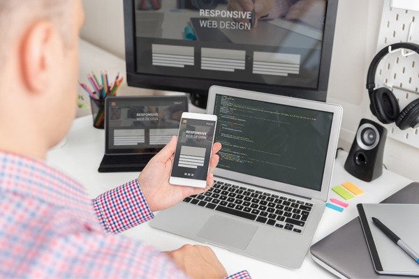 A web designer testing a responsive web design.