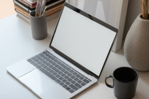 A laptop displaying a blank white screen