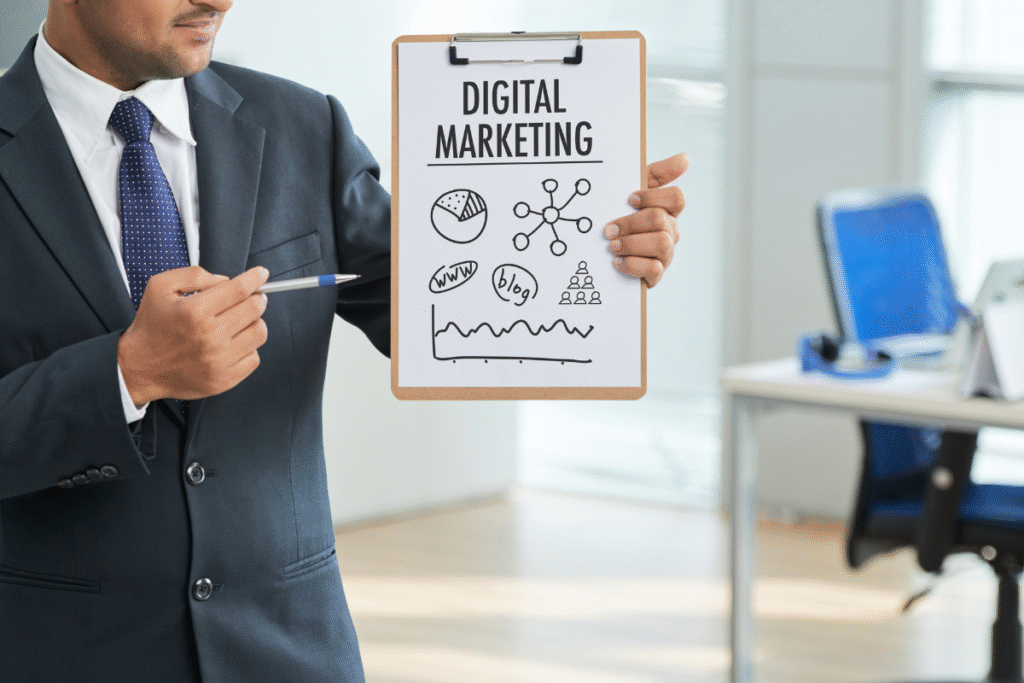 Man pointing to a document labeled 'Digital Marketing'