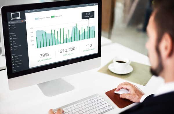 A man reviewing Google Ads campaign status