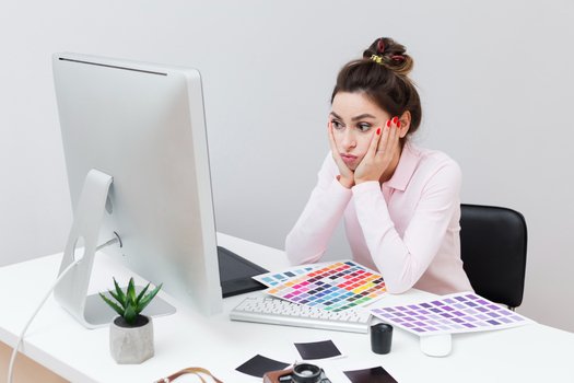 Computer displaying creative ideas for importance of SEO in web design
