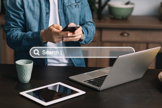 Understanding what is SEO marketing through mobile search demonstration.