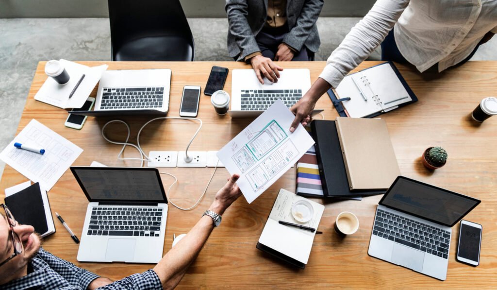 group of people working on website