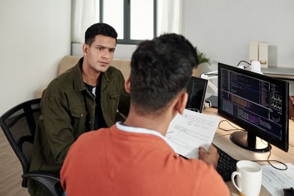 3. Team analyzing adaptive and responsive design layout