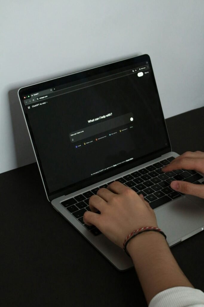 a person using chatgpt via laptop