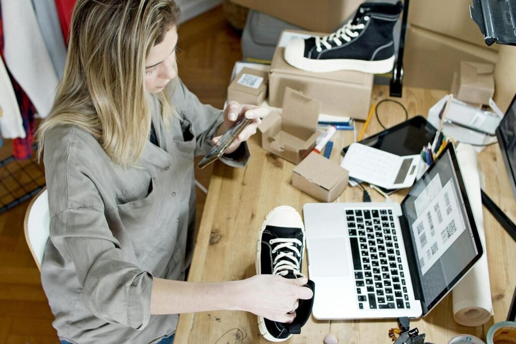 a woman preparing her shoe products for google ads