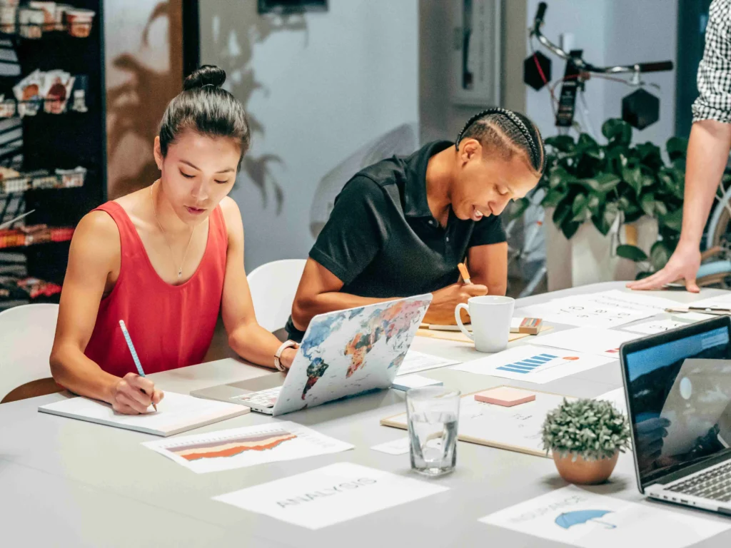 A group of hired SEO experts working in a team