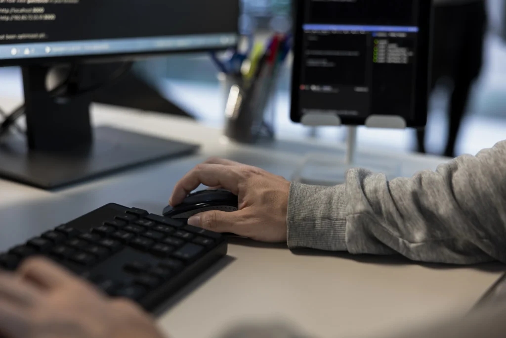 Man making technical fixes while waiting at how long does SEO take