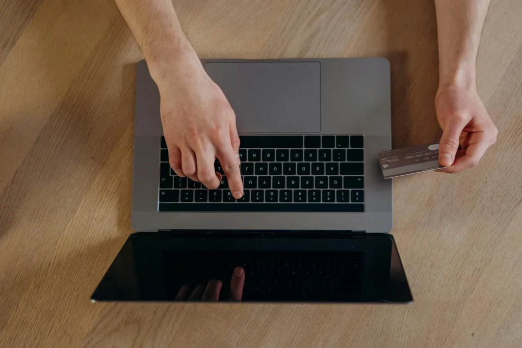 Person making a purchase in an e-commerce website