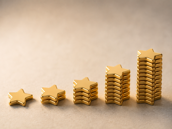 Rising stacks of five-star tokens showing a remodeler's Google reviews growing