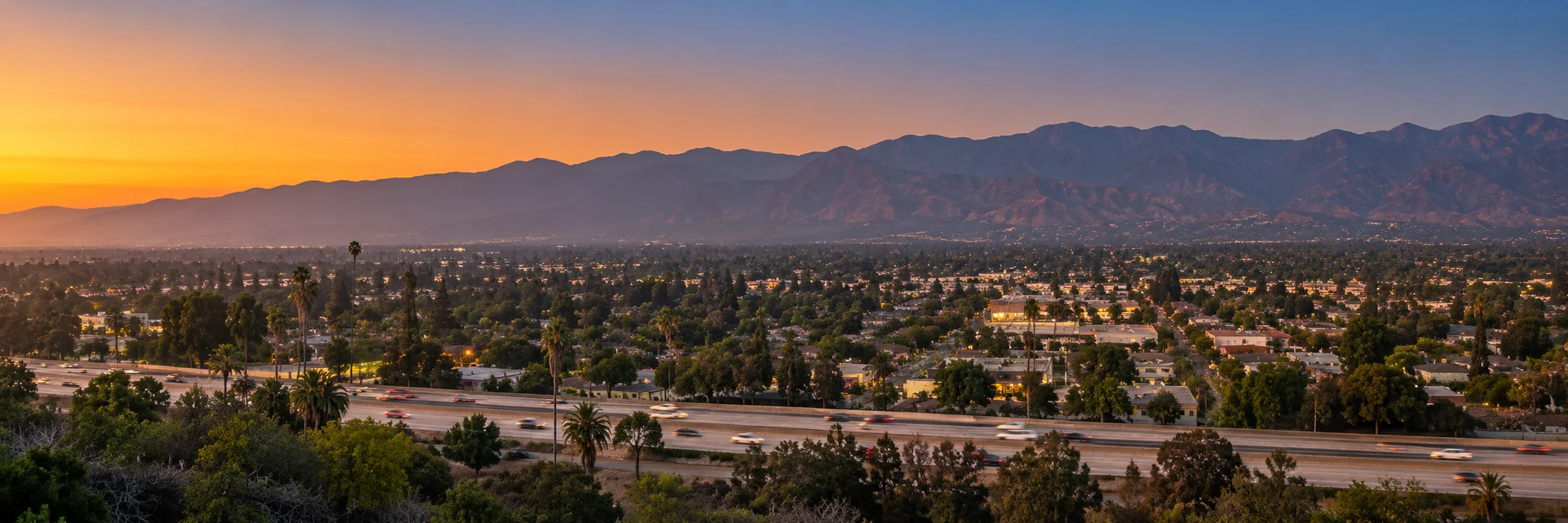 Dusk view over Covina, California toward the San Gabriel Mountains