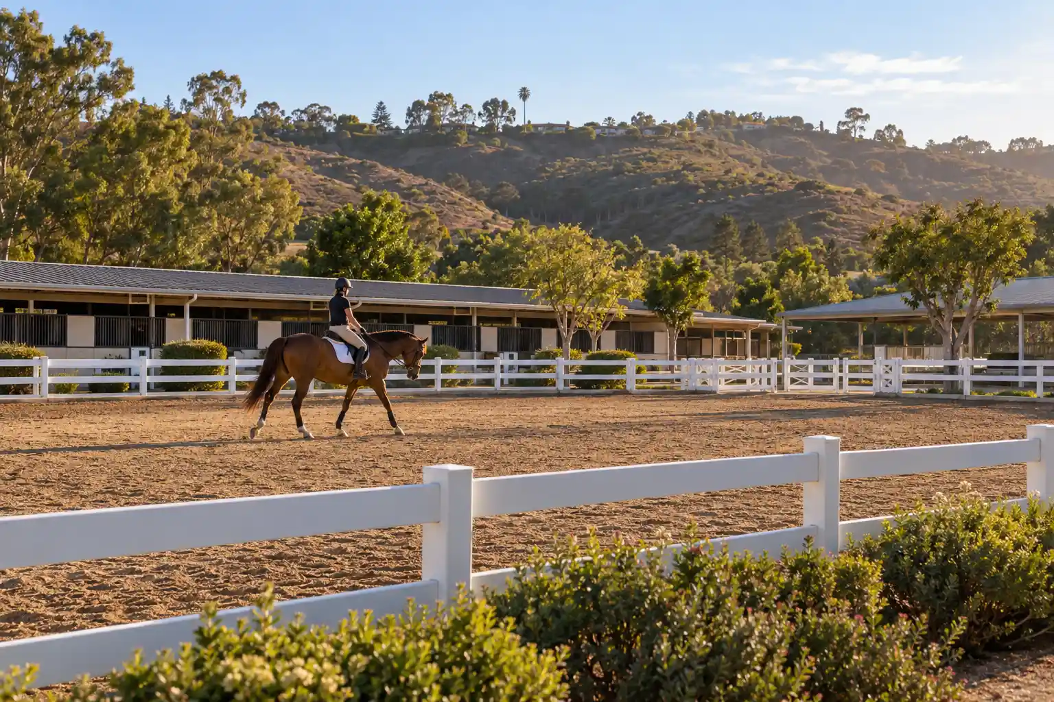 Riding ring and white 3-rail fence at the Peter Weber Equestrian Center, Rolling Hills Estates, CA